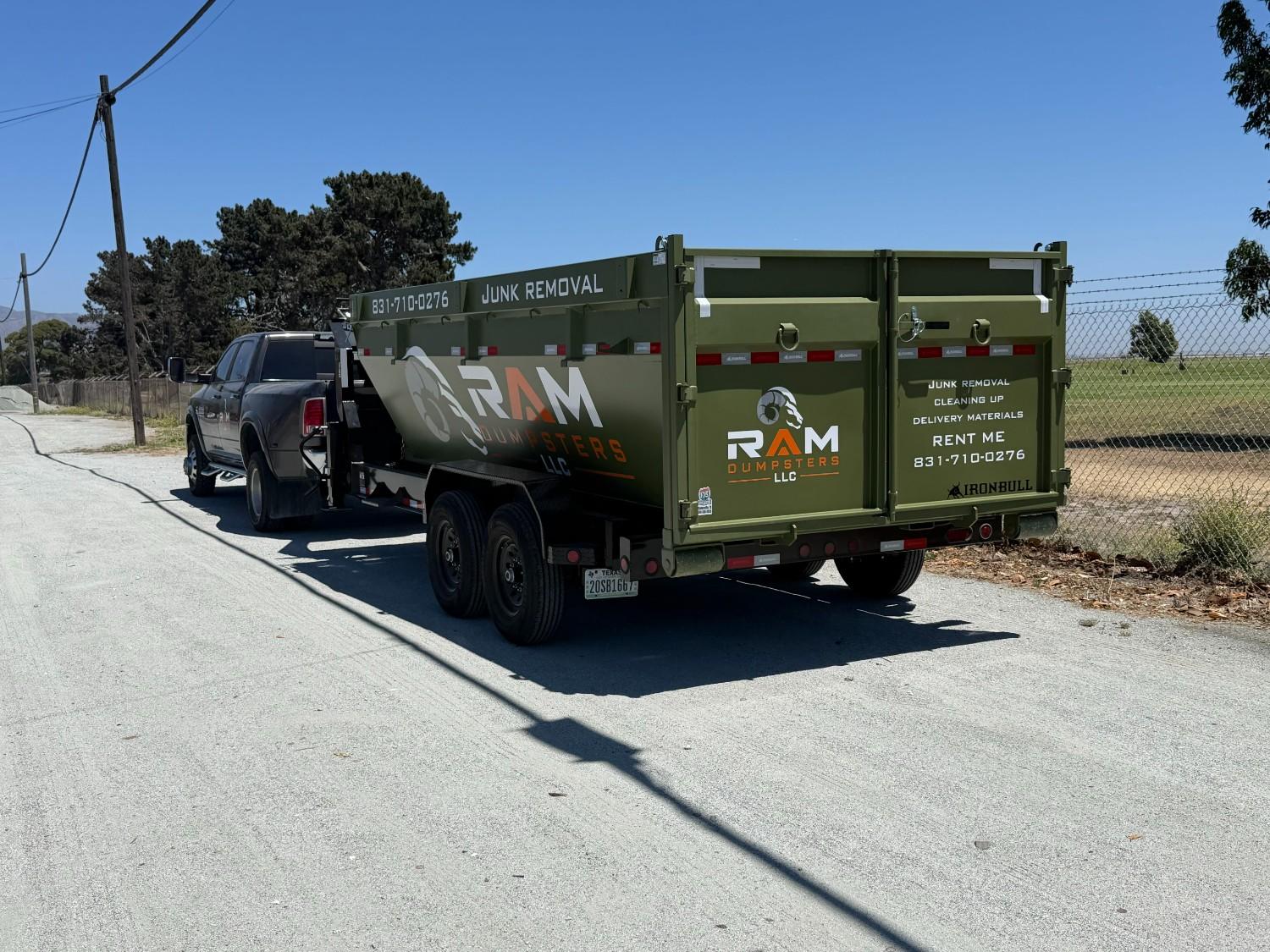 Dumpster trailer parked at a job site